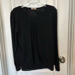 Beautiful black blouse with pleats in front and puff shear long sleeves size L